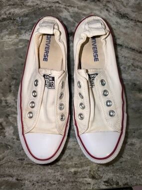 Converse Off-White Canvas Slip-On Sneakers with Maroon Trim